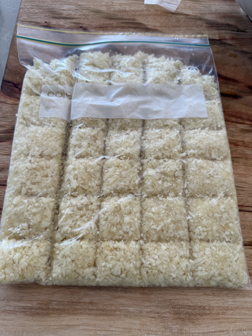 Chopped garlic in a ziplock bag.
