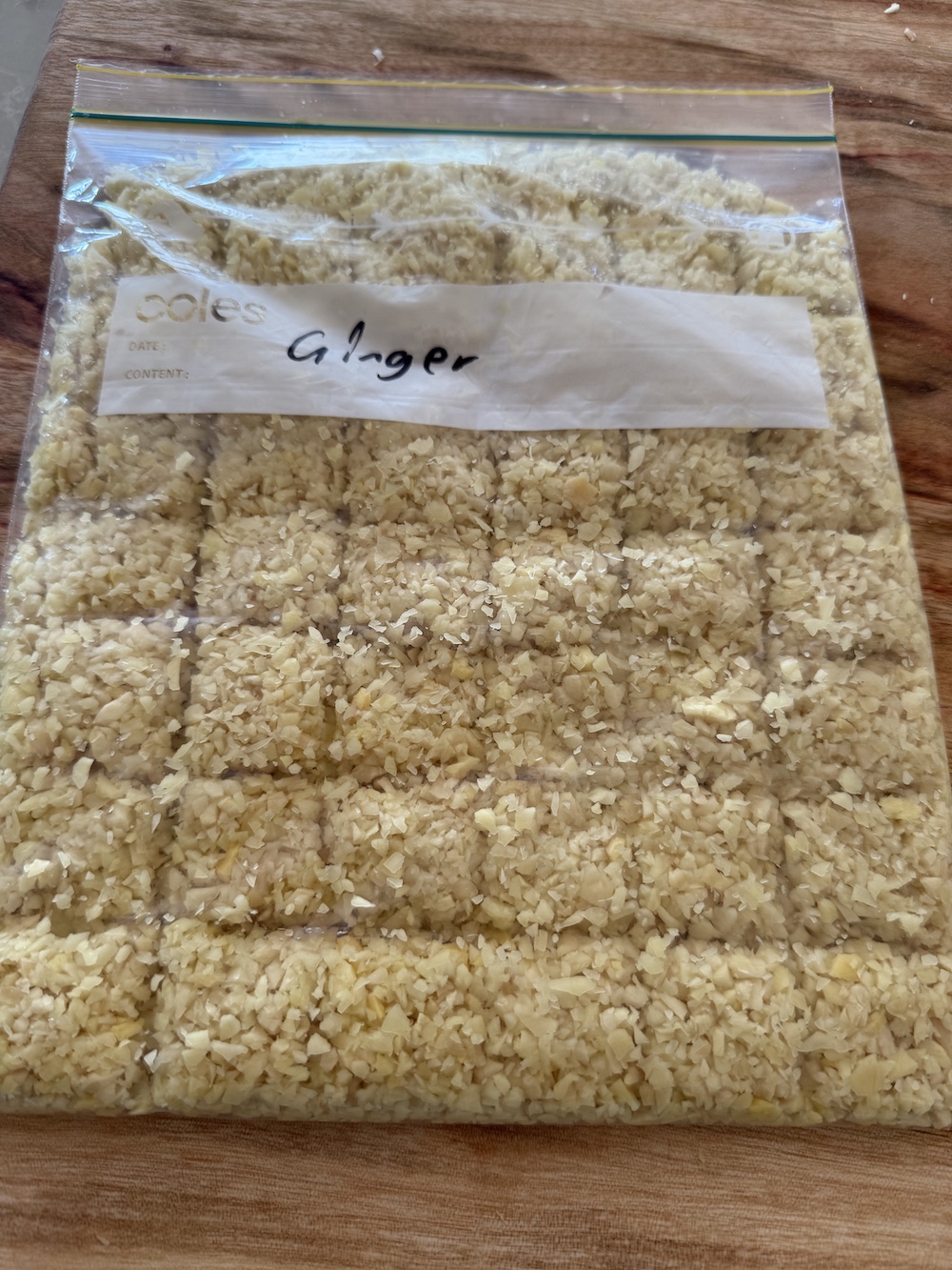 Chopped ginger in a ziplock bag.